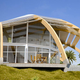 Illustration for article titled This House Provides Sustainable Energy in a Half-Shell